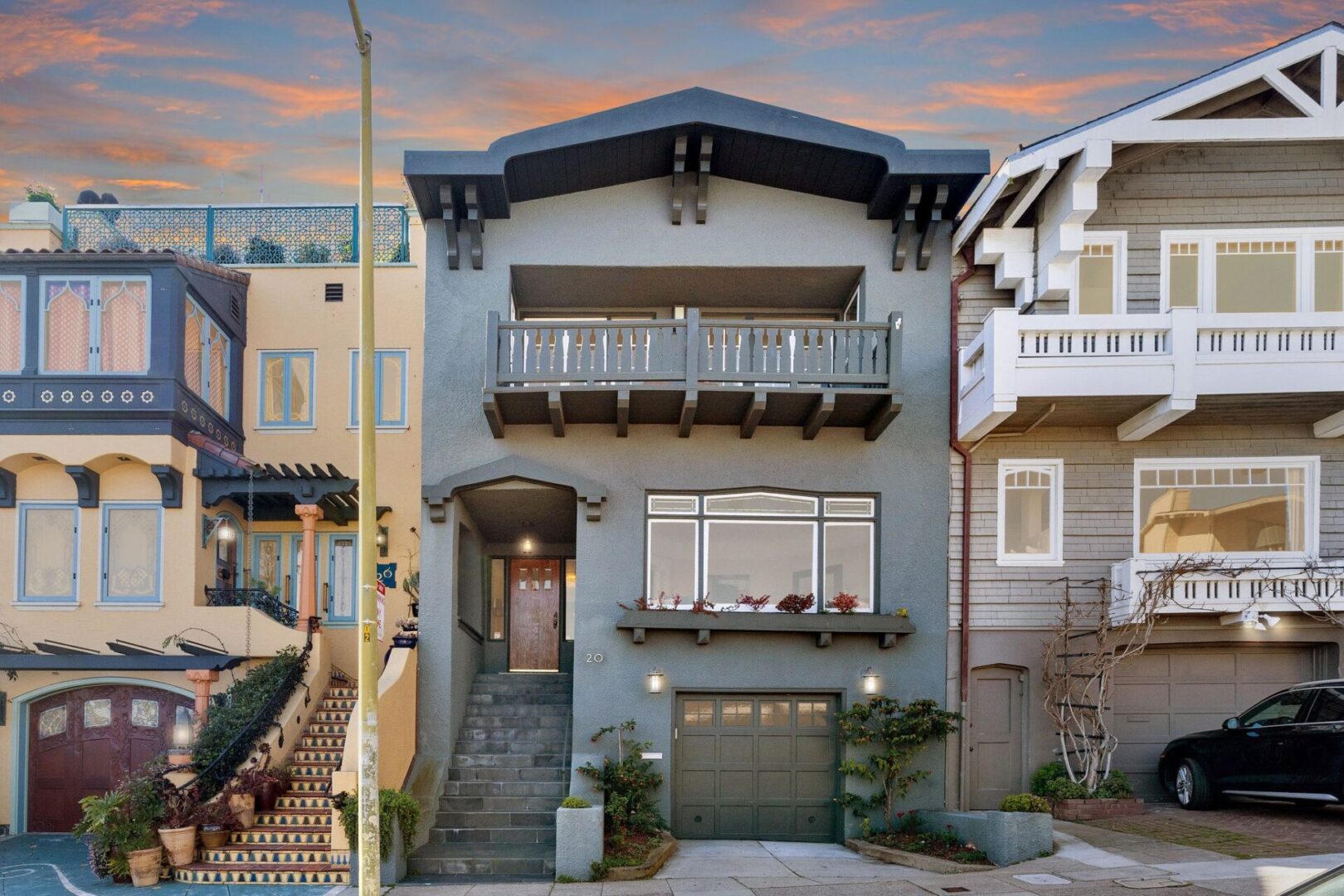 A house with many steps and stairs in front of it.